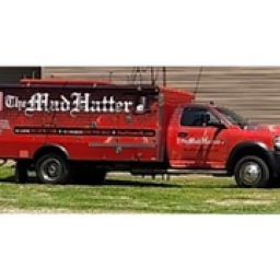The Mad Hatter Service Company logo